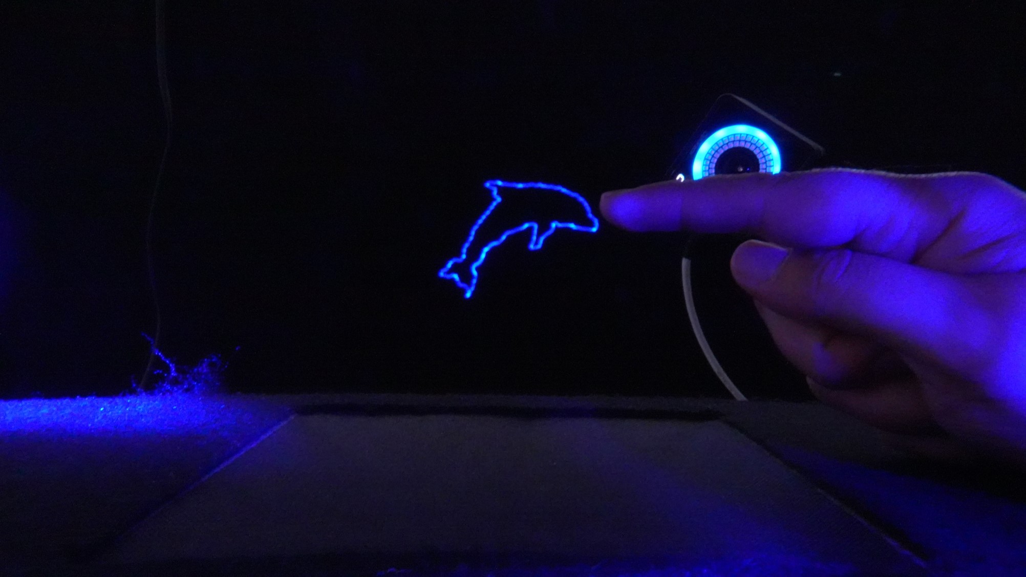 A dolphin shape generated by the ultrasonic levitator.